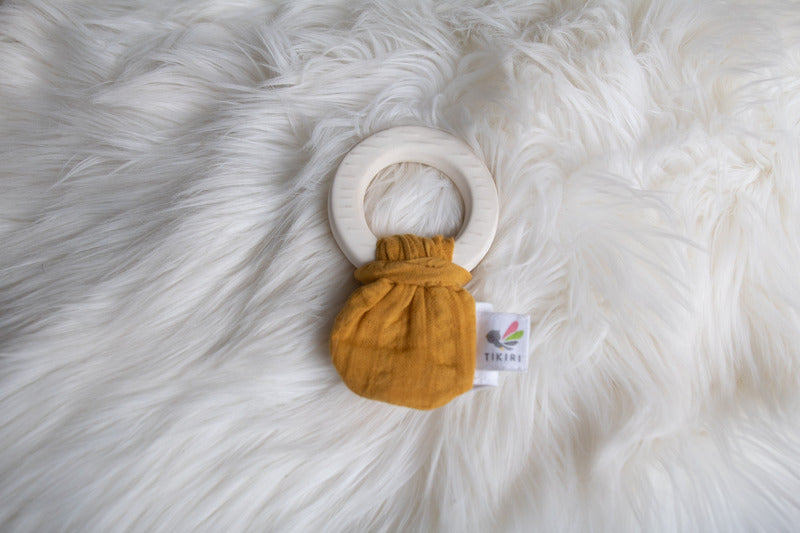 Natural Rubber Teether with a Mustard Muslin Tie