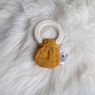 Natural Rubber Teether with a Mustard Muslin Tie