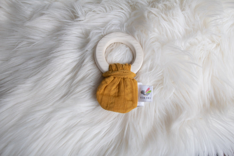 Natural Rubber Teether with a Mustard Muslin Tie